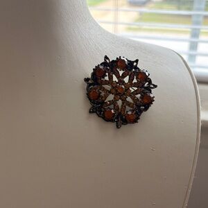 Antique Black and Orange Brooch